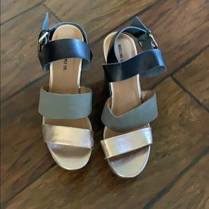 Black, gray, and rose gold wedges